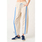 SPORTY STRIPE NYLON PULL ON BARREL LEG PANTS