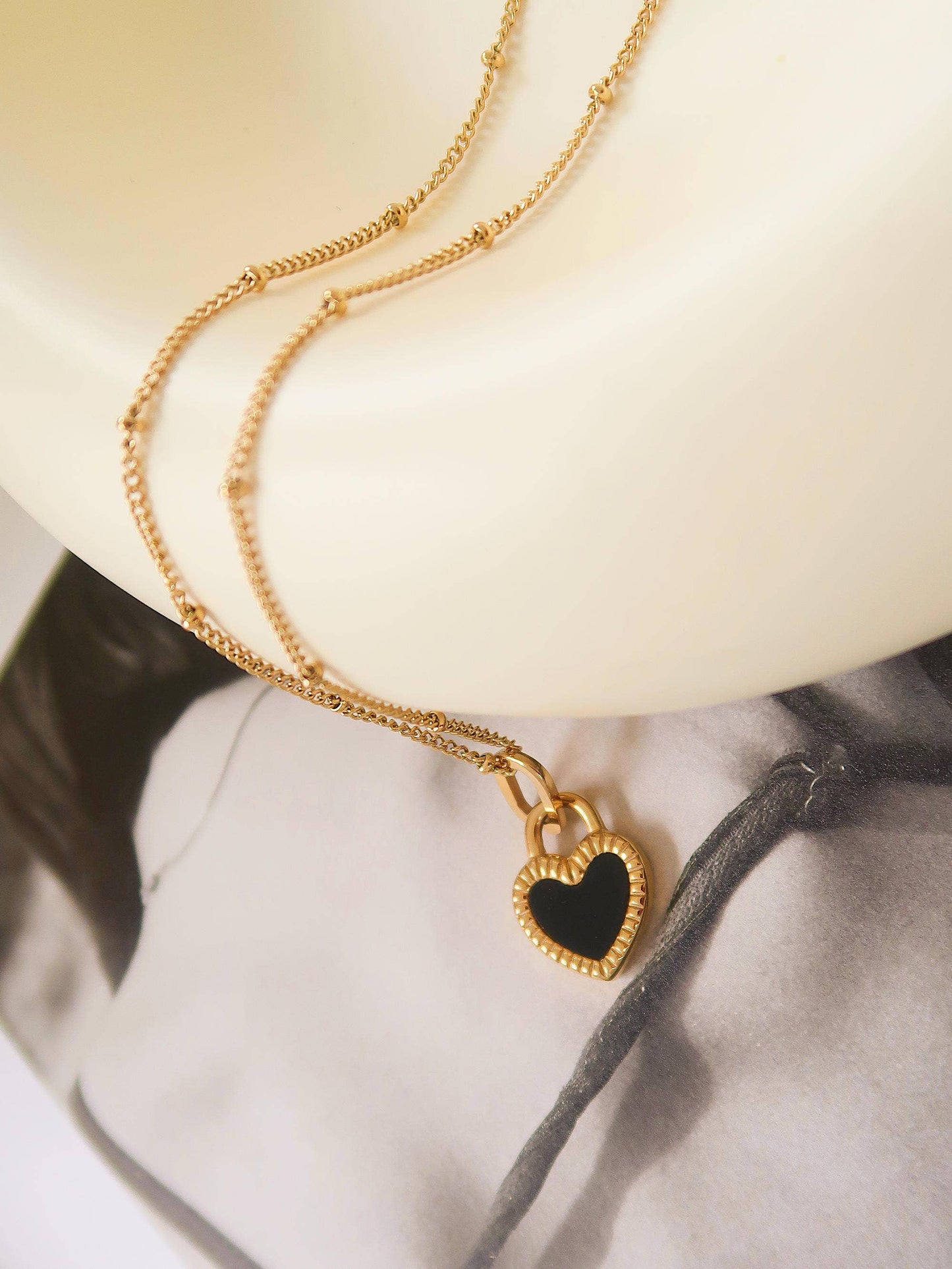 Double-Sided Black & White Heart Necklace