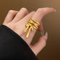 ADJUSTABLE BOLD BOW RING