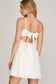 The Flirty Pleated Back Dress